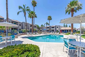 Swimming Pool With Lounge Chairs at Agave Apartments, Tucson, 85704